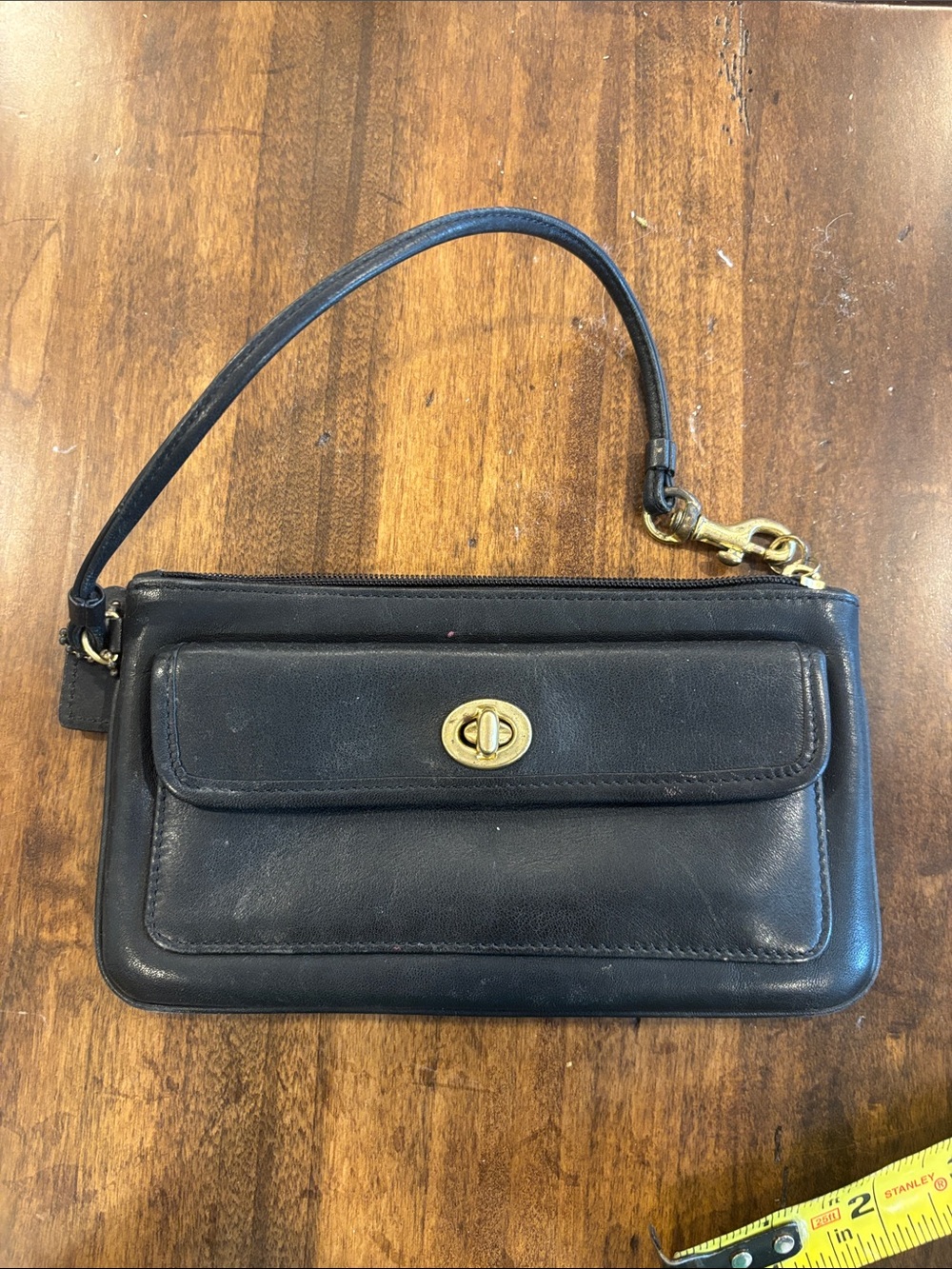 Coach Black Leather Turnlock Wristlet with Gold Hardware